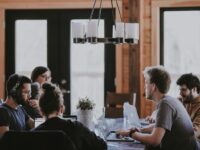 Tech professionals in collaborative workspace representing AI talent
