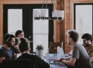 Tech professionals in collaborative workspace representing AI talent